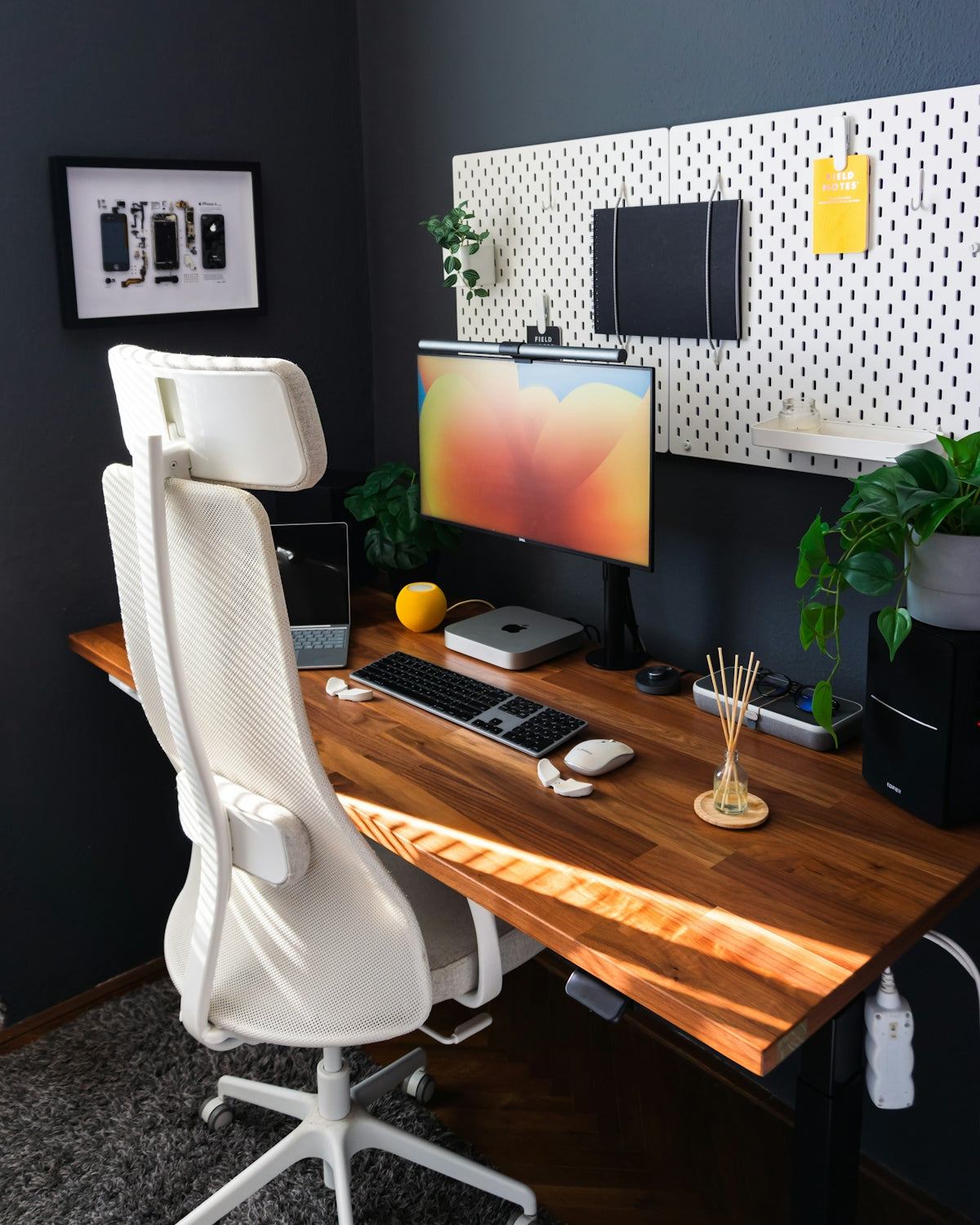 a desk with a computer and a keyboard