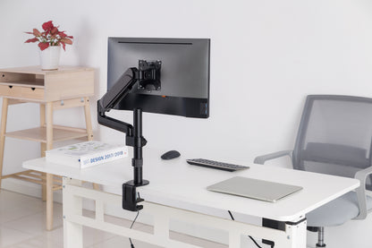 Кронштейн для монітора OfficePro MA721B чорний — лайфстайл-сцена на світлому столі